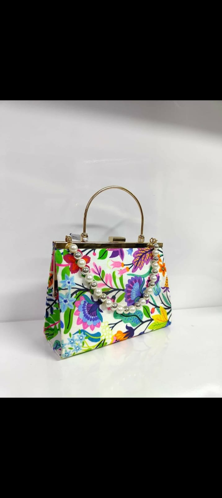 Titan Collection Floral & Geometric Metal Frame Pearl Clutch —   handbag by HandbagsAvenue